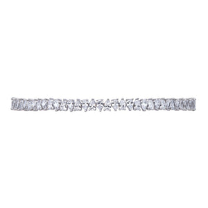 The FALLON Jagged Edge Pear Toggle Choker Necklace in rhodium is made from rhodium-plated brass and cubic zirconia crystal.  Adjustable to any neck size.