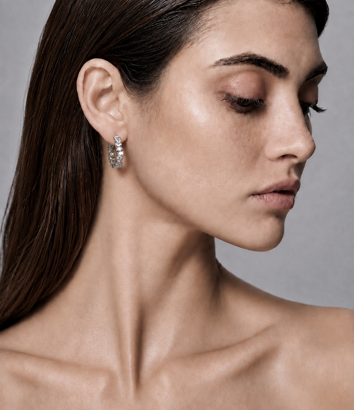 JAGGED EDGE PEAR HOOPS - RHODIUM