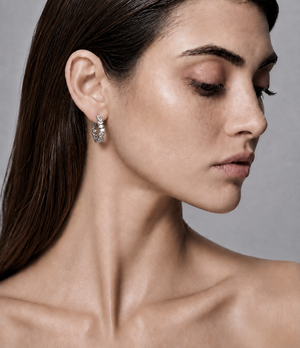 JAGGED EDGE PEAR HOOPS - RHODIUM
