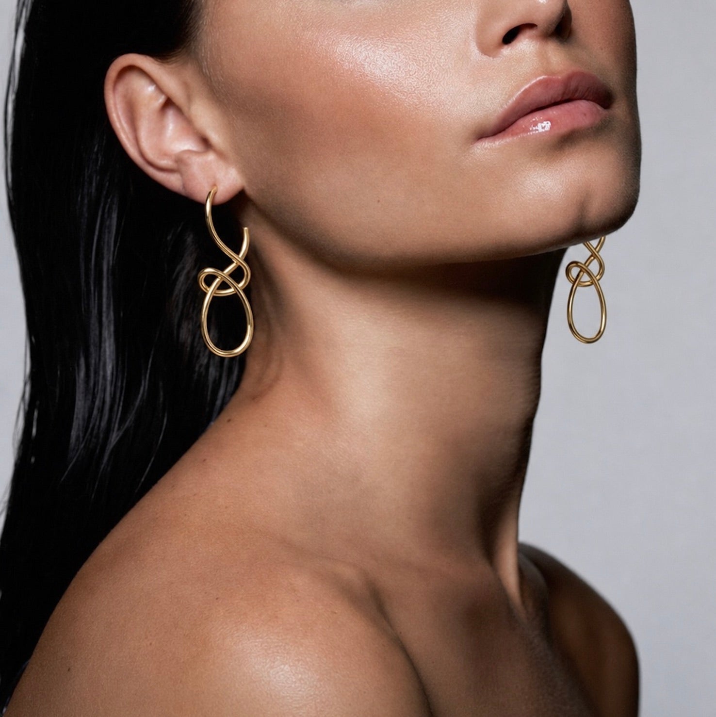 SCULPTURAL TWIST EARRINGS - GOLD