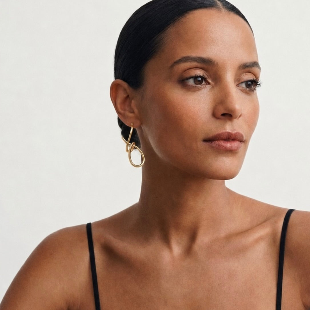 SCULPTURAL TWIST EARRINGS - GOLD