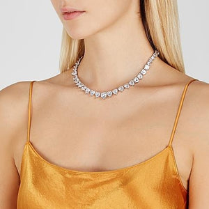 The FALLON Heart Rivière Collar Necklace in rhodium.  Choker length and perfect.  Plated brass and cubic zirconia.
