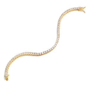 The FALLON Grace Tennis Bracelet in gold.  Simple, every day jewelry.  Gold plated brass and cubic zirconia crystal.
