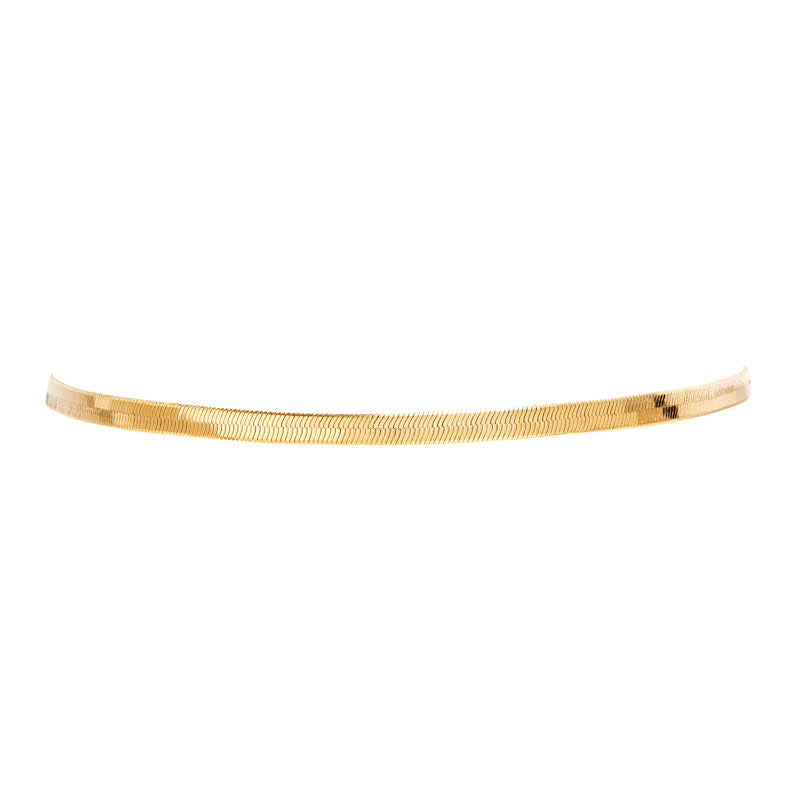 THE FALLON LIQUID HERRINGBONE CHAIN CHOKER NECKLACE IS MADE FROM FINE GOLD-PLATED BRASS.