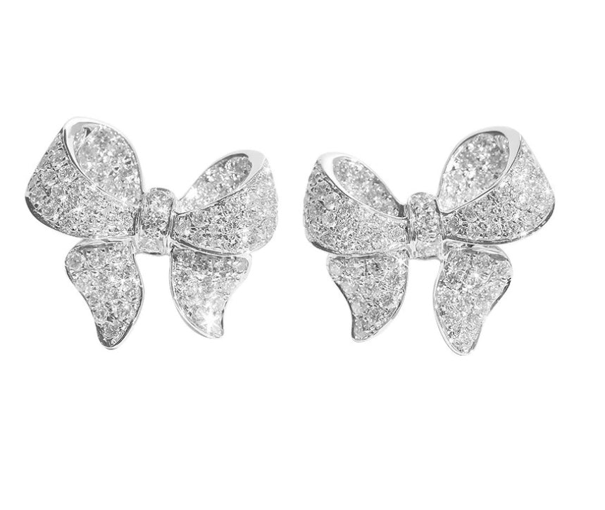 18ct White Gold 076ct Round  Baguette Diamond Bow Earrings