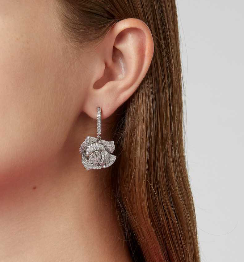 The FALLON Pavé Rose Drop Earrings in rhodium.
